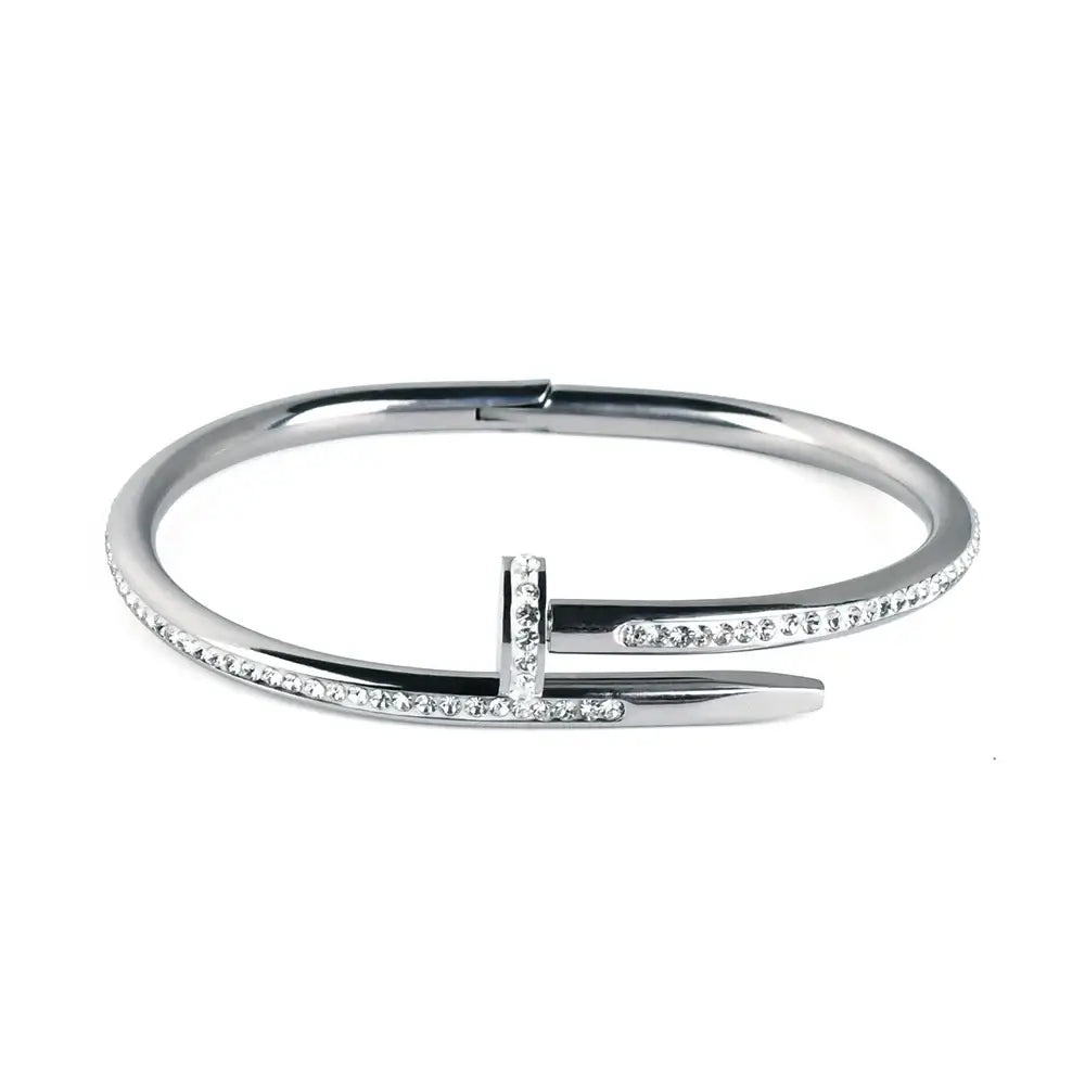 a silver design bracelet set with gemstones all around