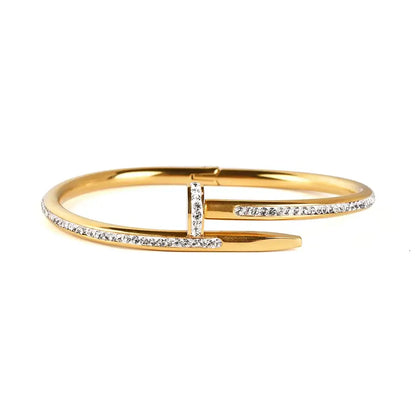 a gold design bracelet set with gemstones all around