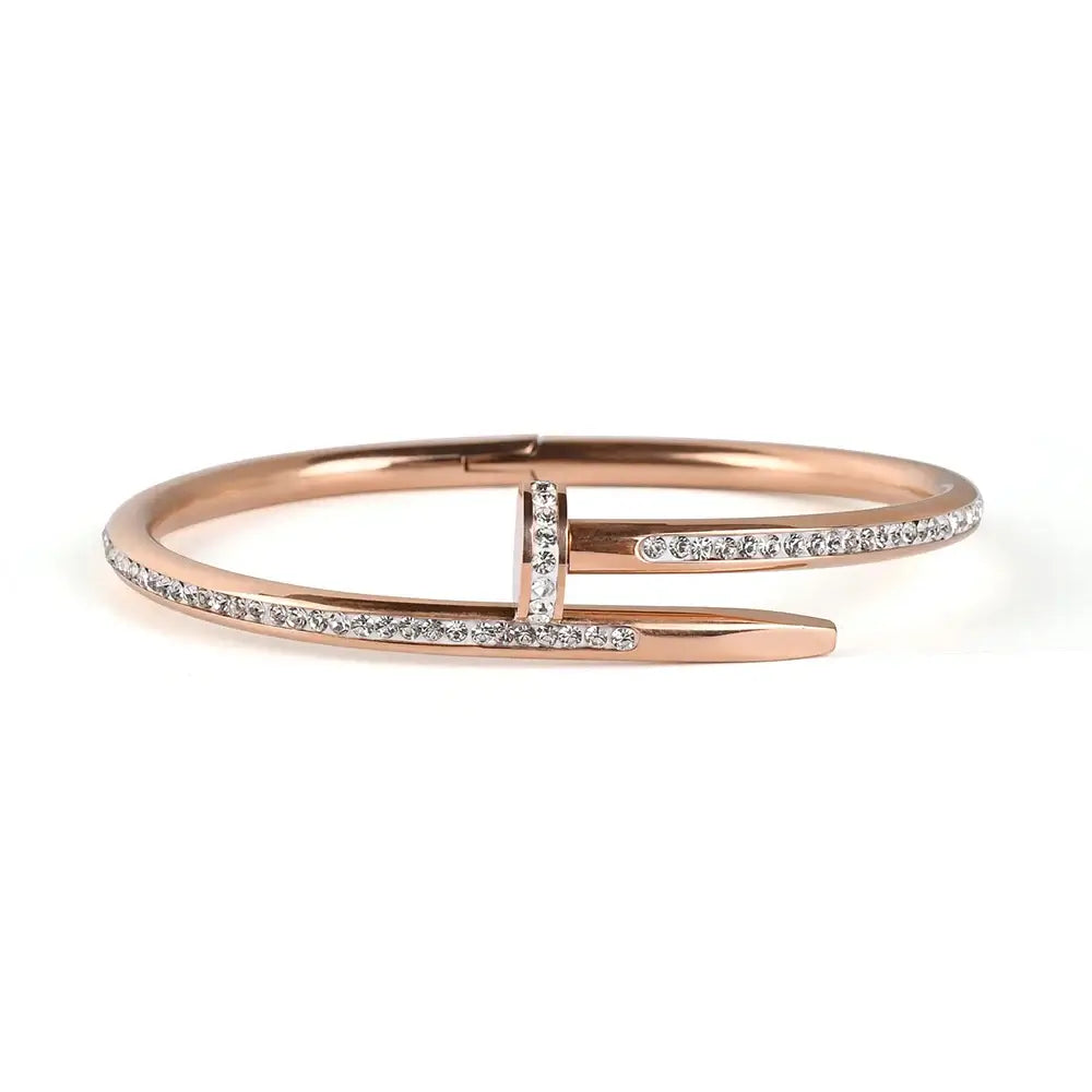 a rose gold design bracelet set with gemstones all around