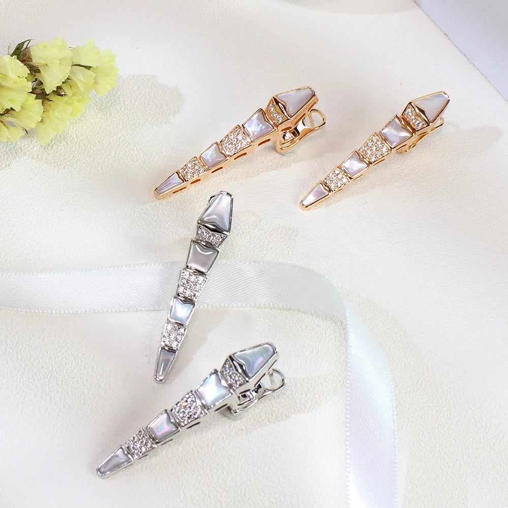 silver and rose gold version of earrings with gemstones