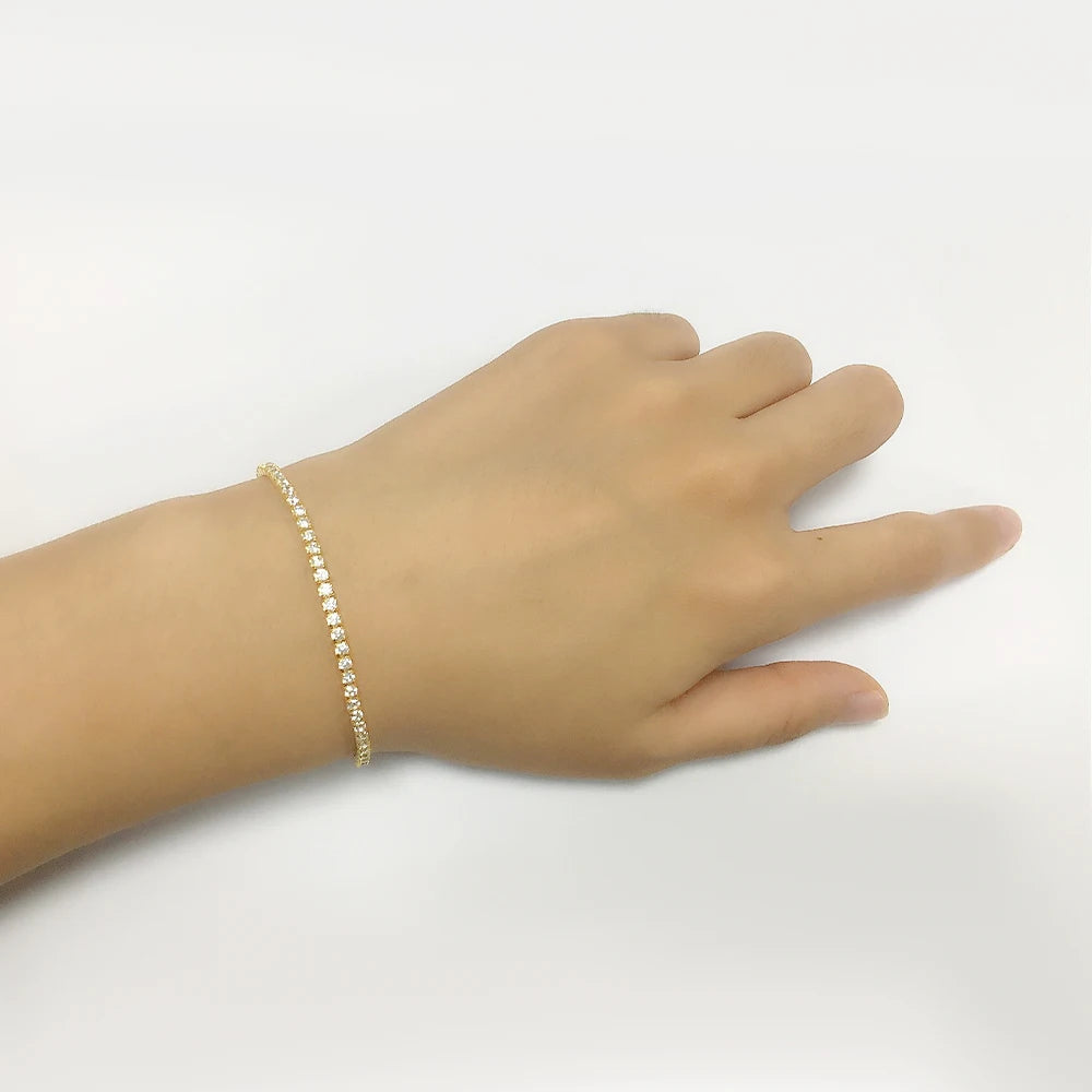 a hand with a bracelet on it
