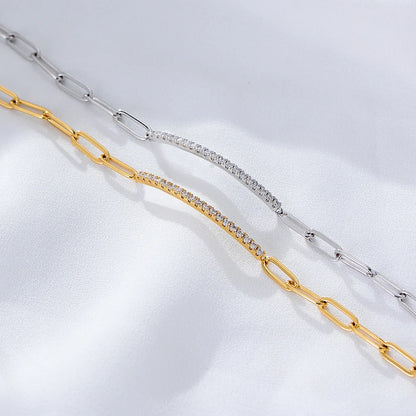a set of gold and silver chains