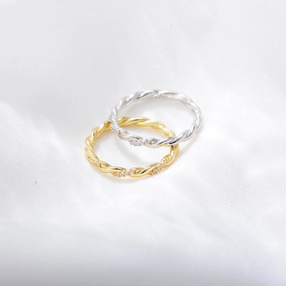a silver and gold variant of a ring
