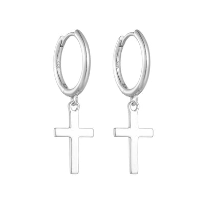 a pair of silver cross earrings with a white background