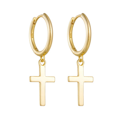 a pair of gold cross earrings with a white background